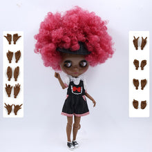 Afropoupée - Poupée noire Fashion Aya en style salopette écolière