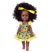 Afropoupée - Poupée noire Zoé en robe florale bleue et jaune et avec un bandeau jaune
